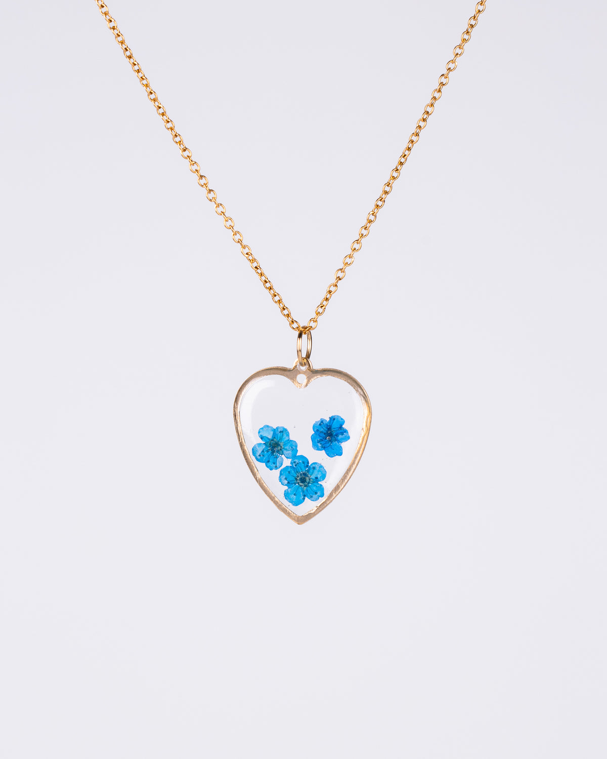 Handmade gold-plated clear heart-shaped jewellery set with blue flowers - Earrings - VJ Designs